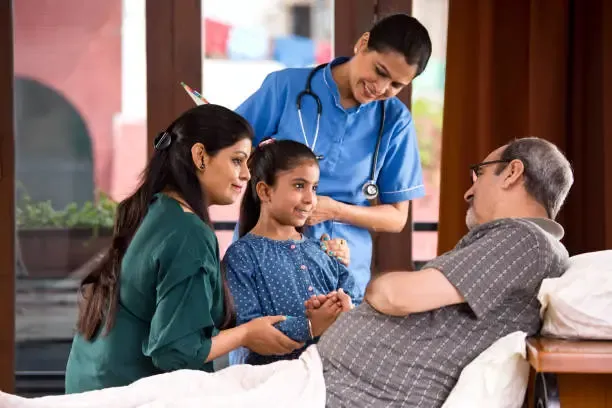 Caregiver talking to an elderly woman